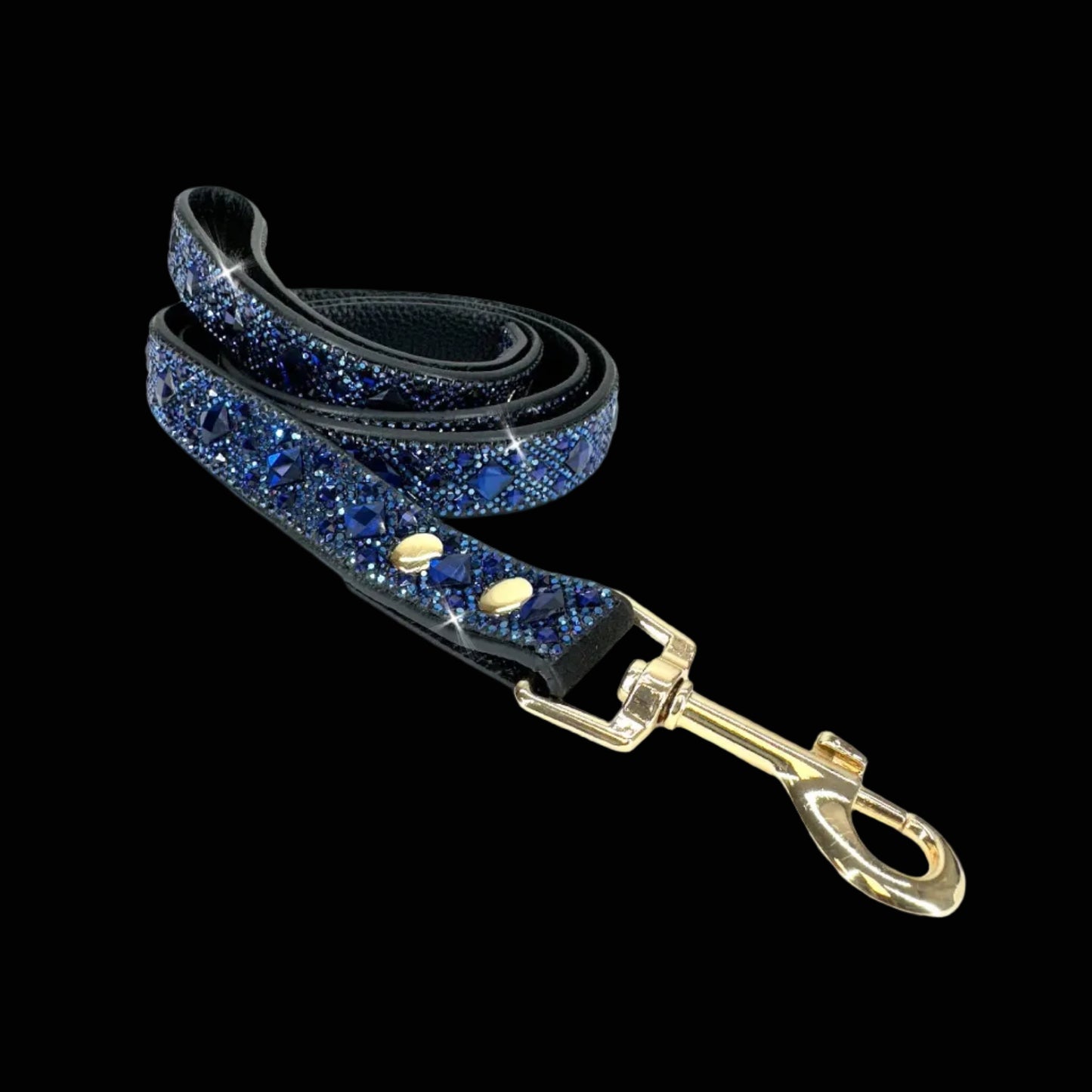 Dog leash with blue glittery design and gold hardware on a white background