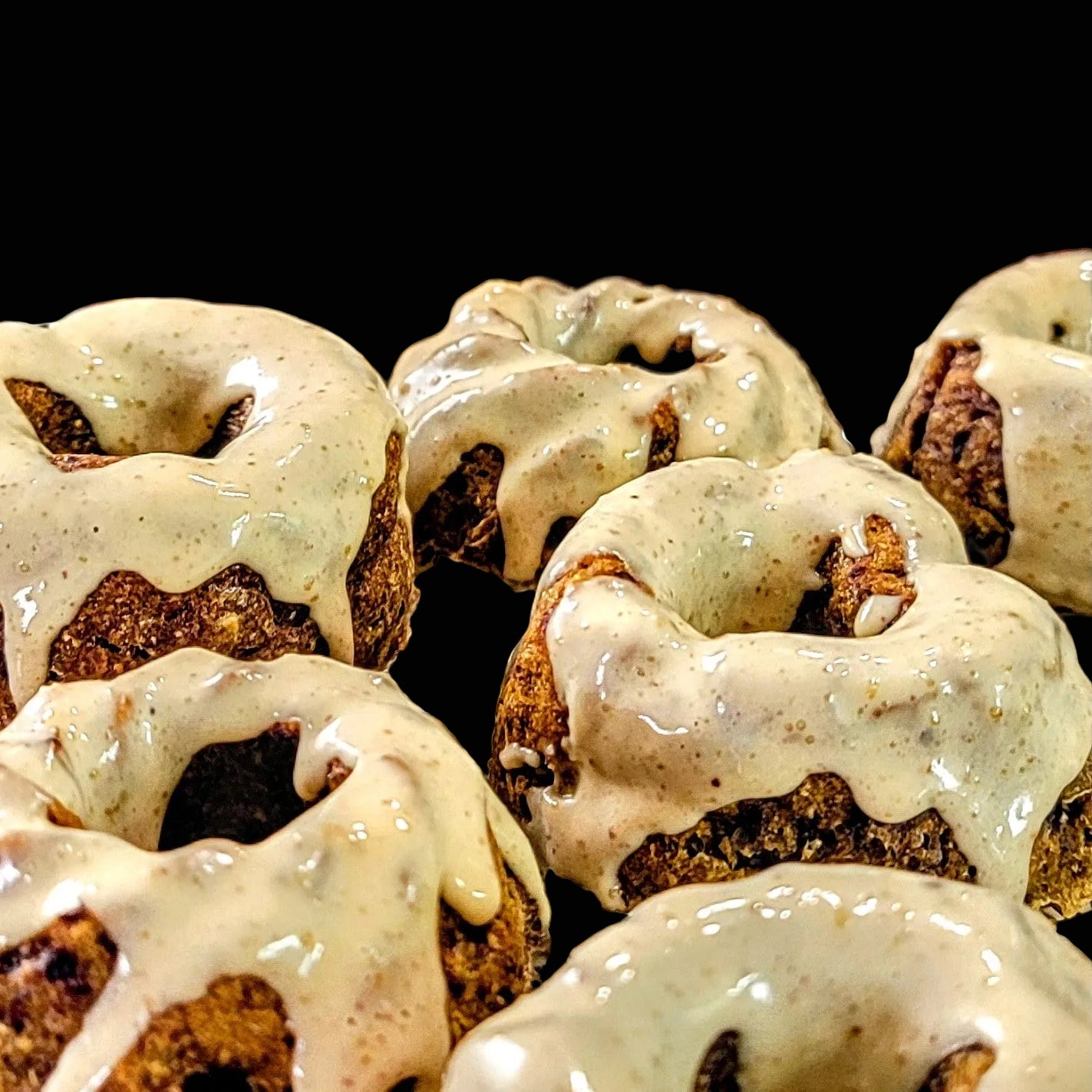 Baked goods with a glaze on a cooling rack