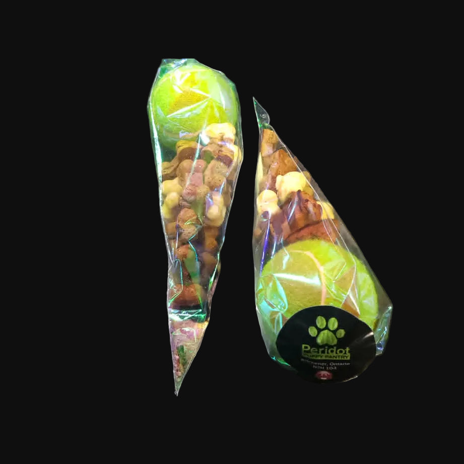 Two cone-shaped packages on a black with 'Peridot Puppy Pantry branding.