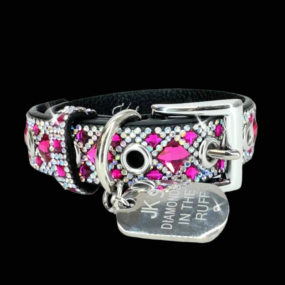 Dog collar with pink gemstones and silver hardware on a black background