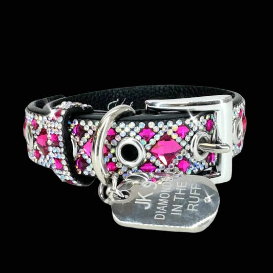 Dog collar with pink gemstones and silver hardware on a black background