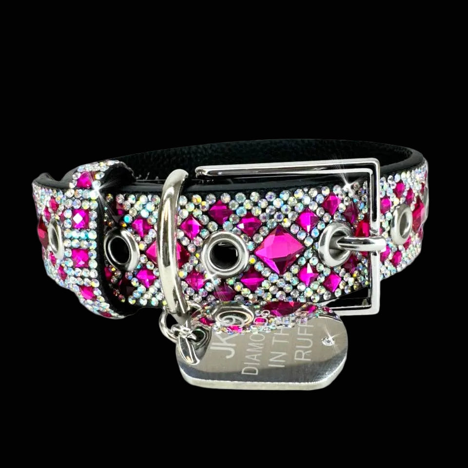 Dog collar with colorful gemstones and a brand tag on a white background