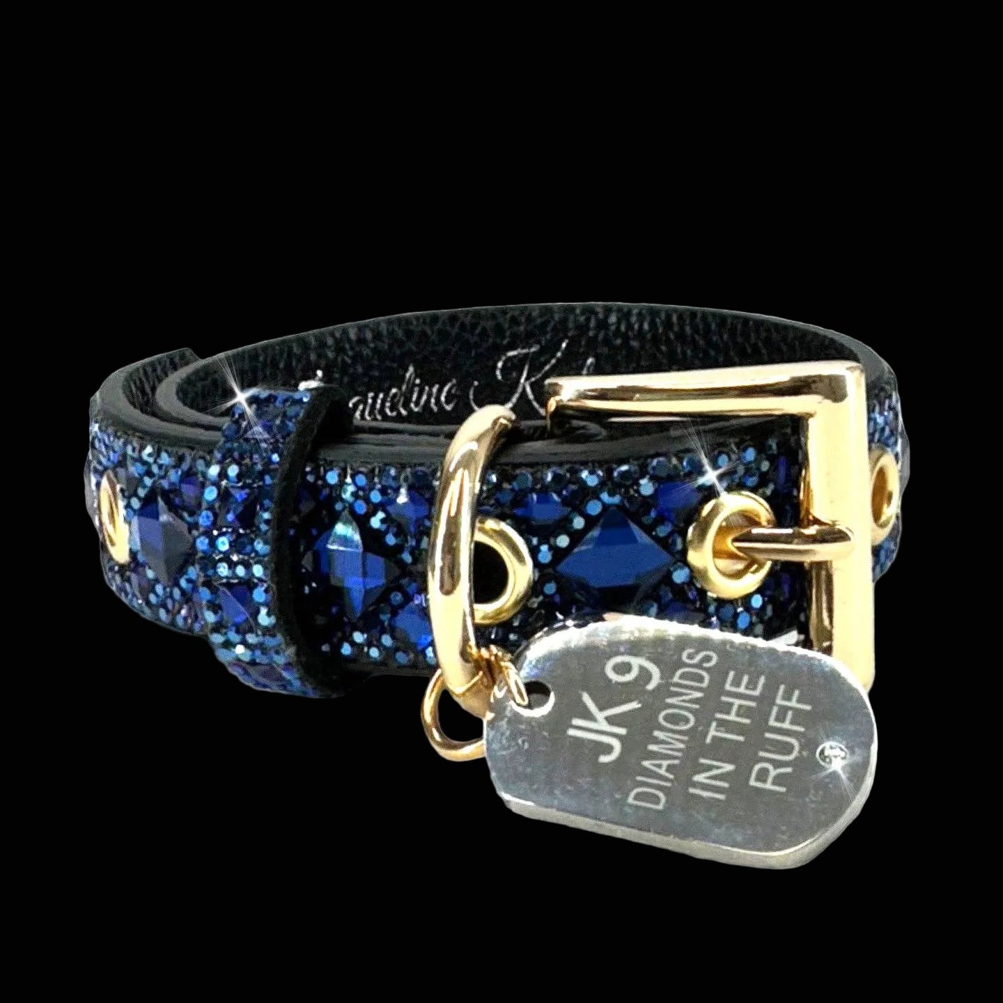 Dog collar with blue gemstones and gold accents on a Black background
