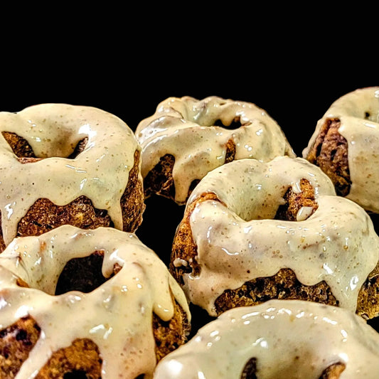 Baked goods with a glaze on a cooling rack