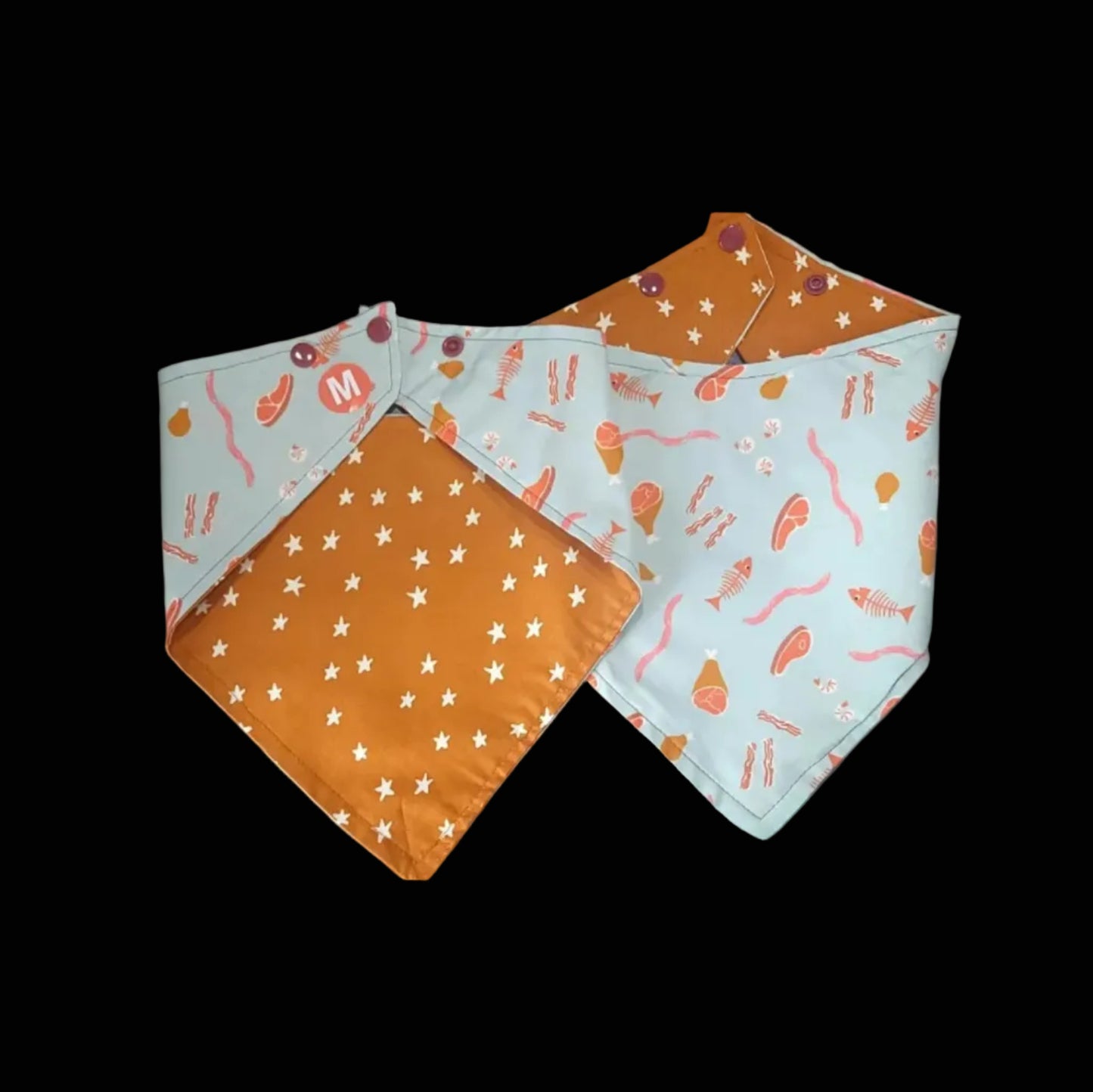 Two fabric bandanas with different patterns on a black background